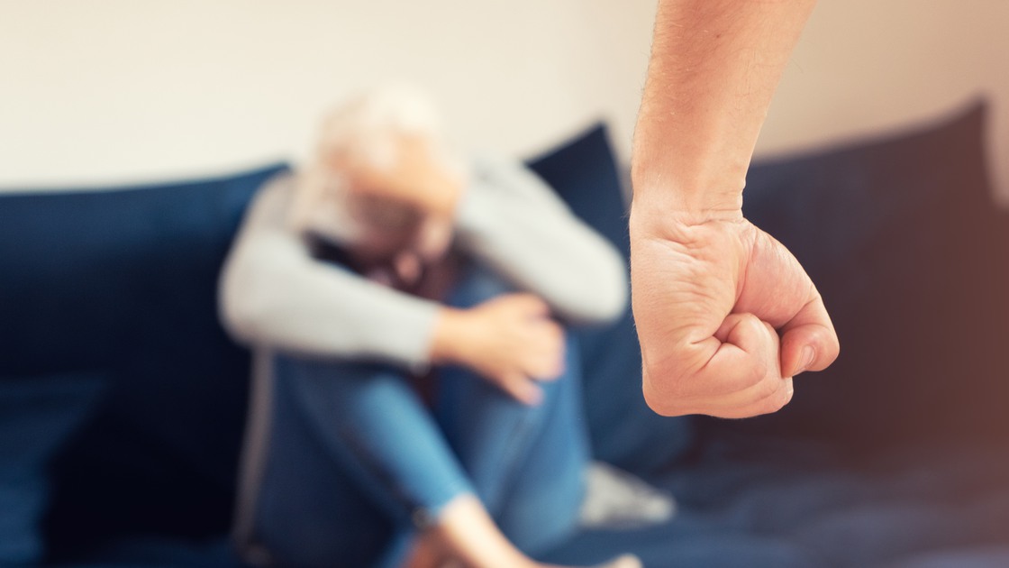 Domestic violence and physical fight in relationship. Angry violent man, aggressive fist.